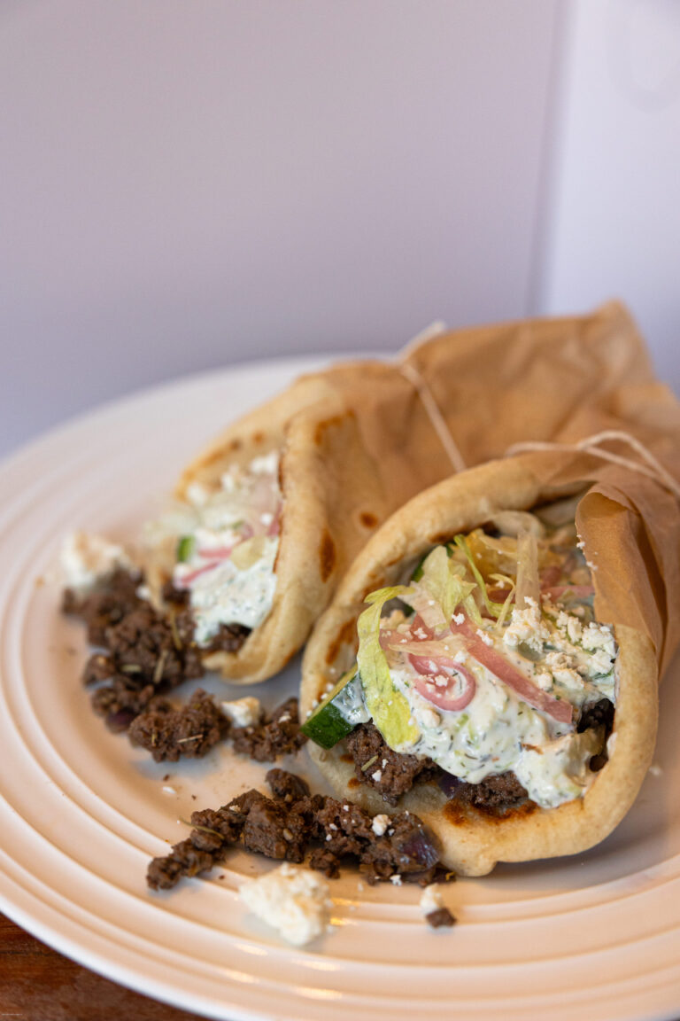 Homemade Gyros on a plate with toppings