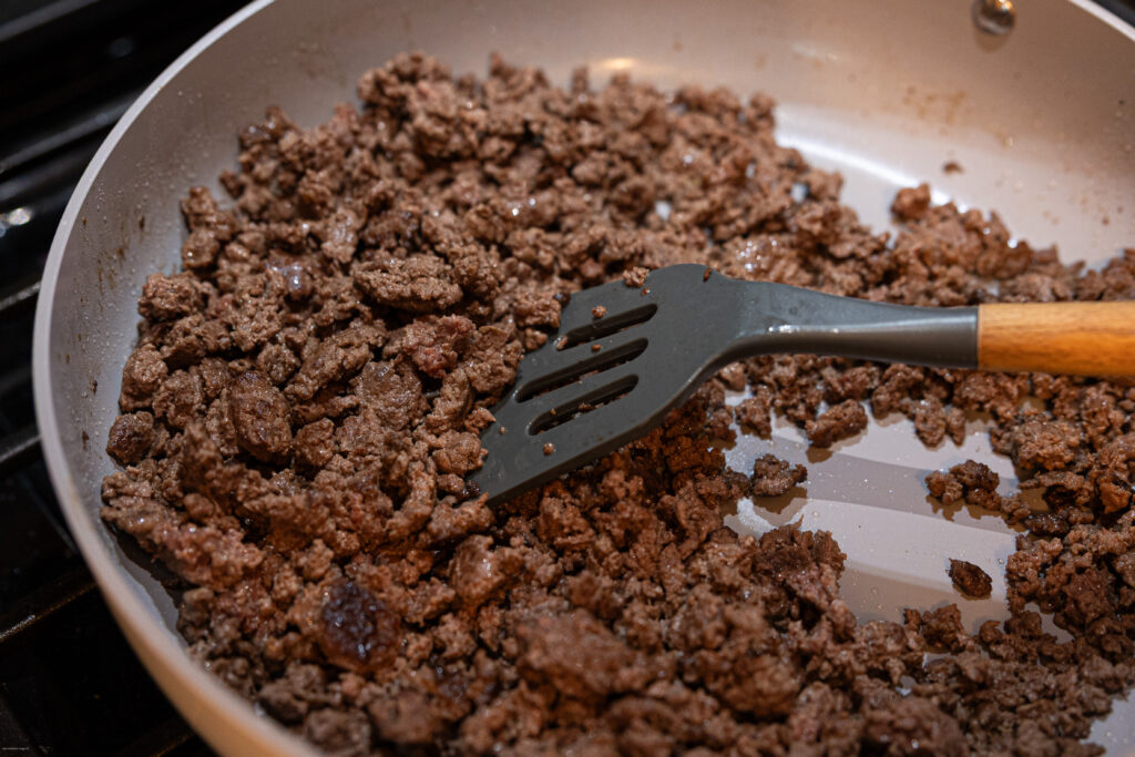 Ground beef cooked in a pan