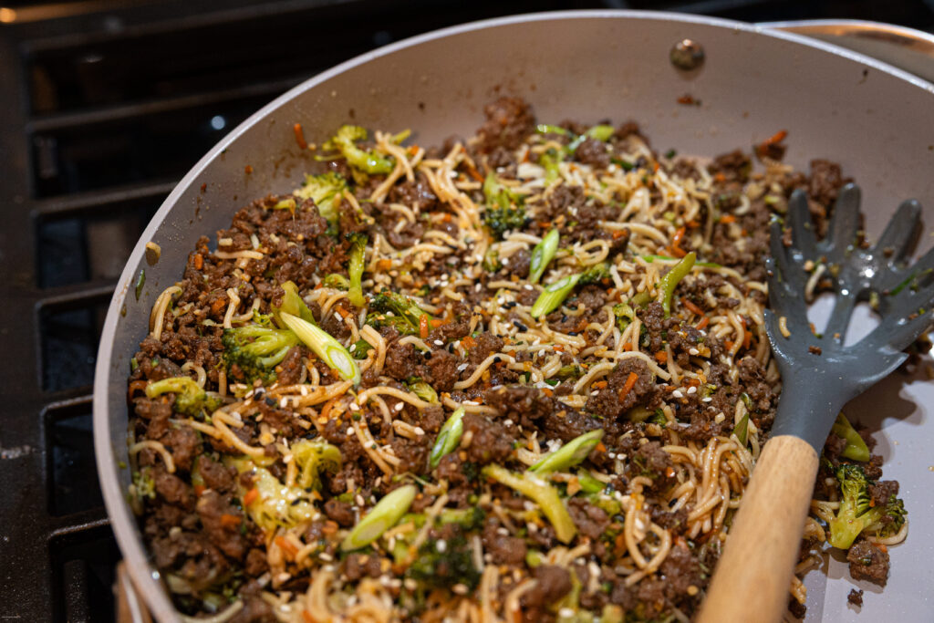 Japanese beef and noodle stir fry in a pan