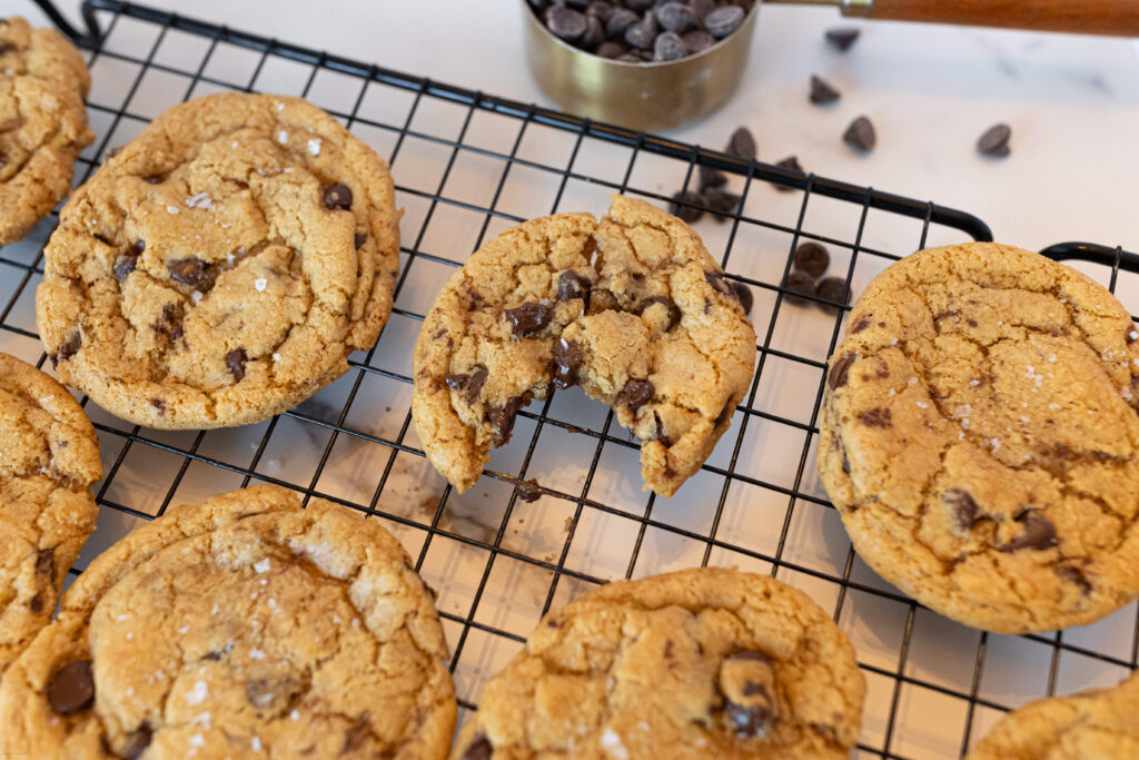 chocolate chip cookies on a cookie drying rack