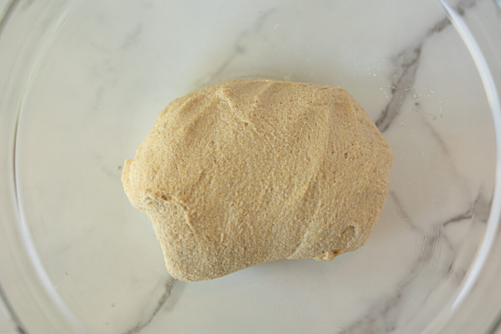 dough in a glass bowl
